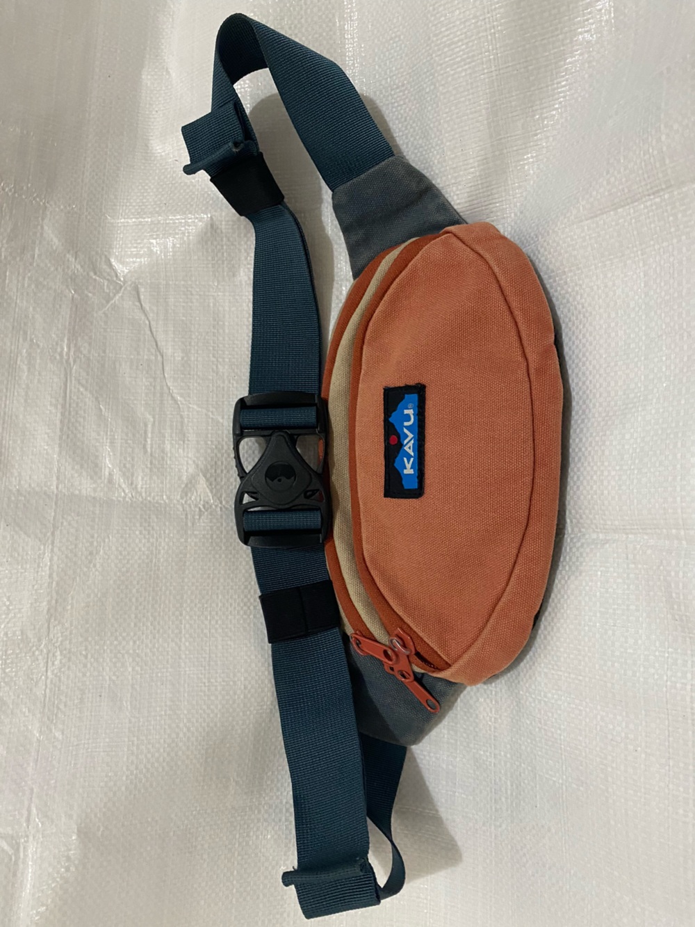 KAVU Rust Canvas Sling Belt Bag with Navy Strap